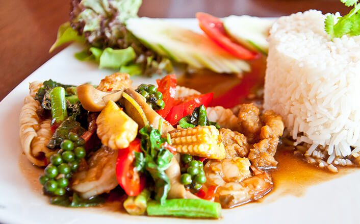 Photo of Thai food on white plate