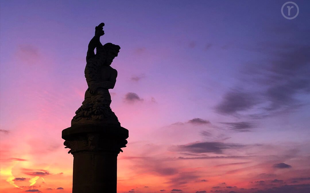 Photograph of stunning sunrise and statue of Neptune looking towards the sea at Lowestoft, Suffolk
